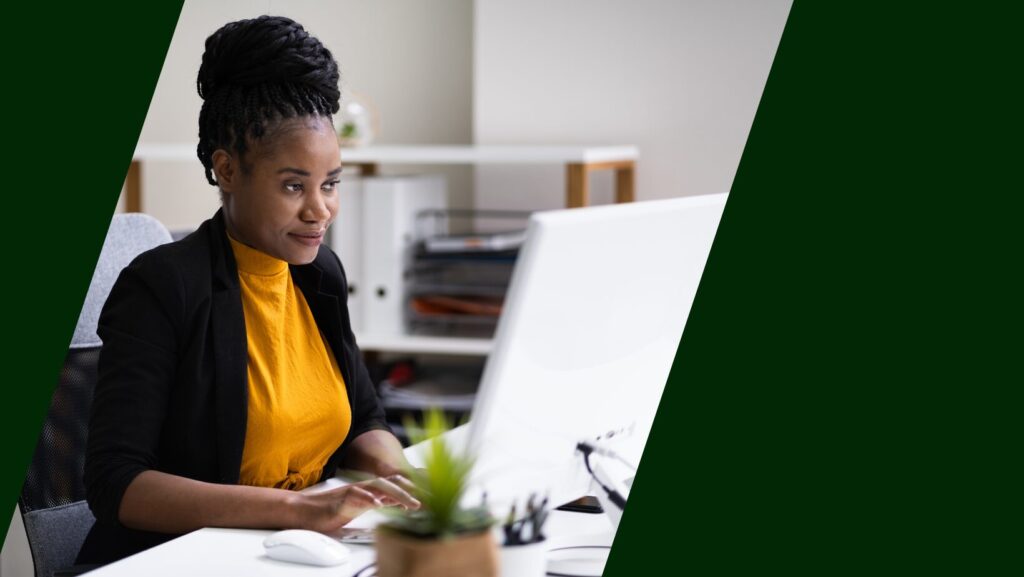 A non profit marketer looking at her computer